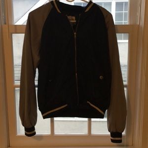Blue and silver bomber jacket
